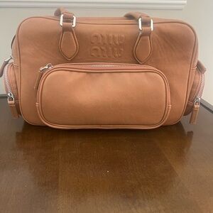 Miu Miu Pocket Nappa leather top-handle bag